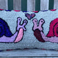 Tufted Snail Love Pillow