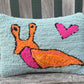 Tufted Orange Slug Pillow